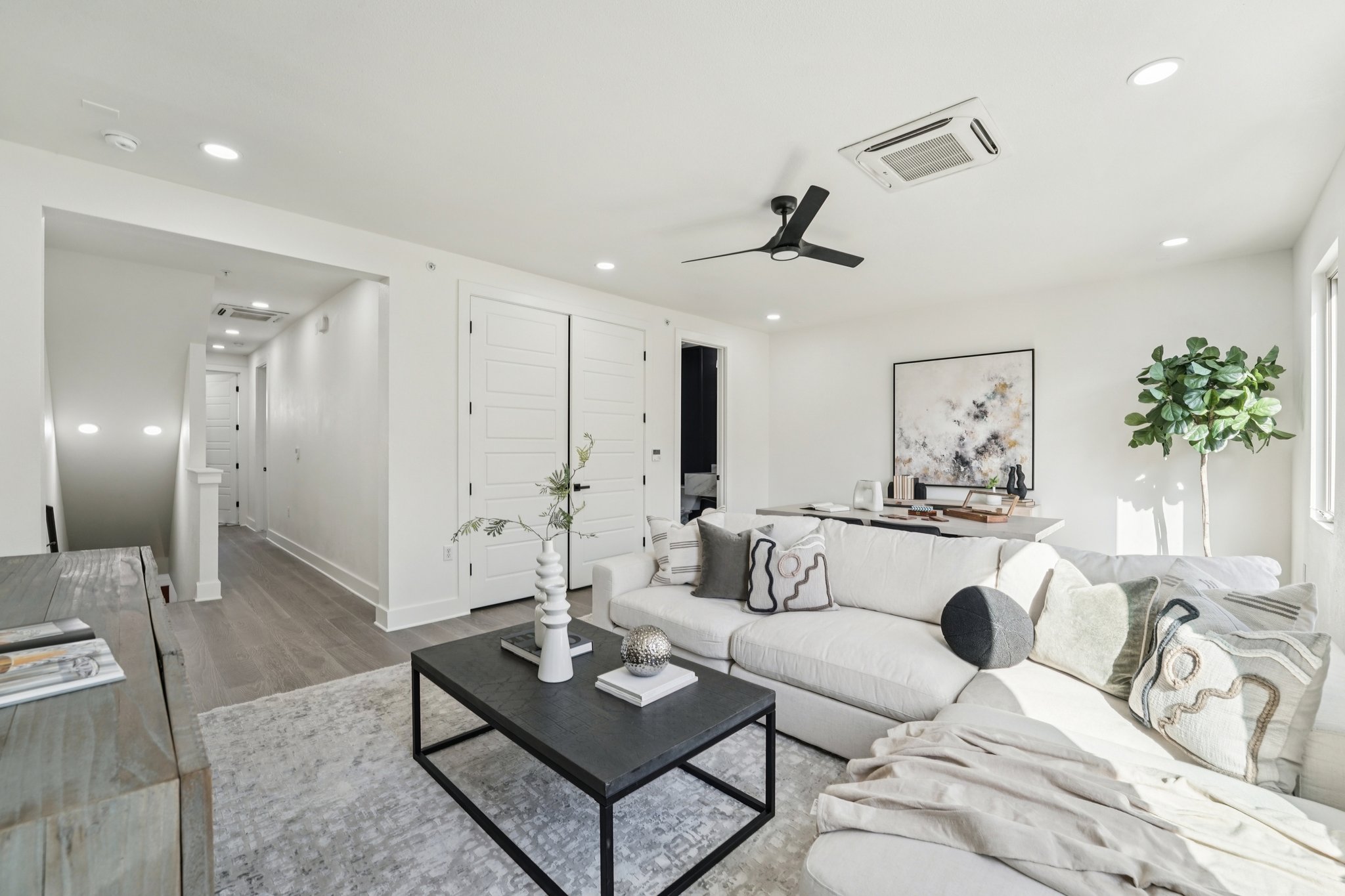 2811 Zach Scott Street Austin, TX 78723 - Photo 17 of 37 Living room with ceiling fan, wood finished floors, and recessed lighting