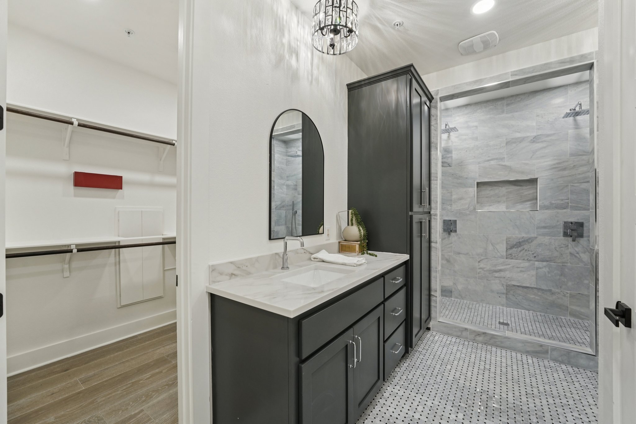 2811 Zach Scott Street Austin, TX 78723 - Photo 22 of 37 Full bathroom with a spacious closet, vanity, recessed lighting, and a shower stall