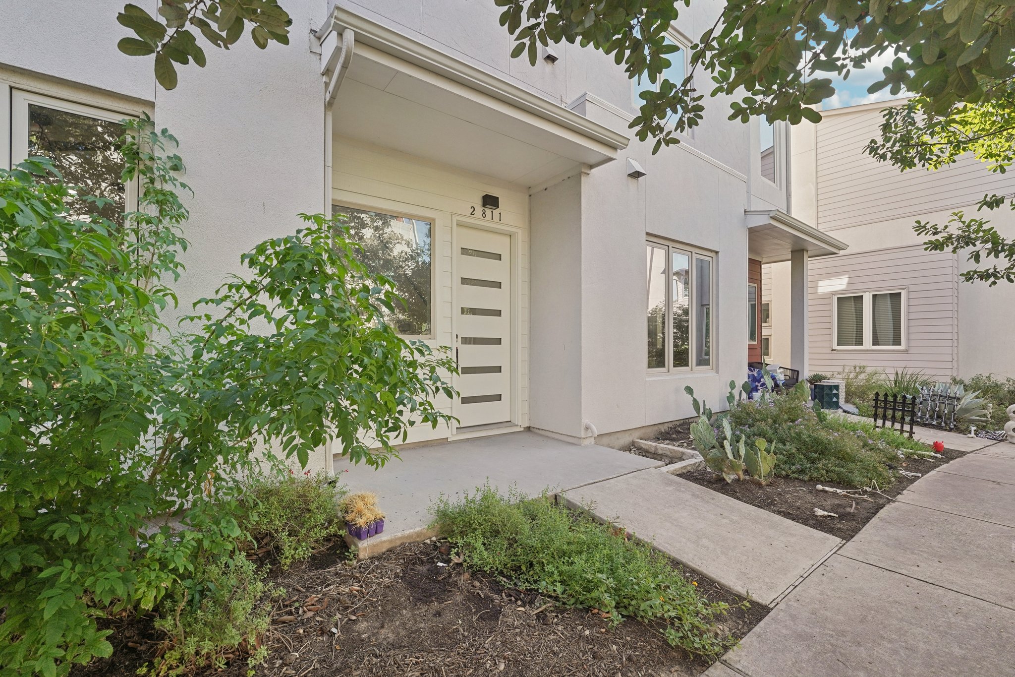 2811 Zach Scott Street Austin, TX 78723 - Photo 3 of 37 Entrance to property with stucco siding