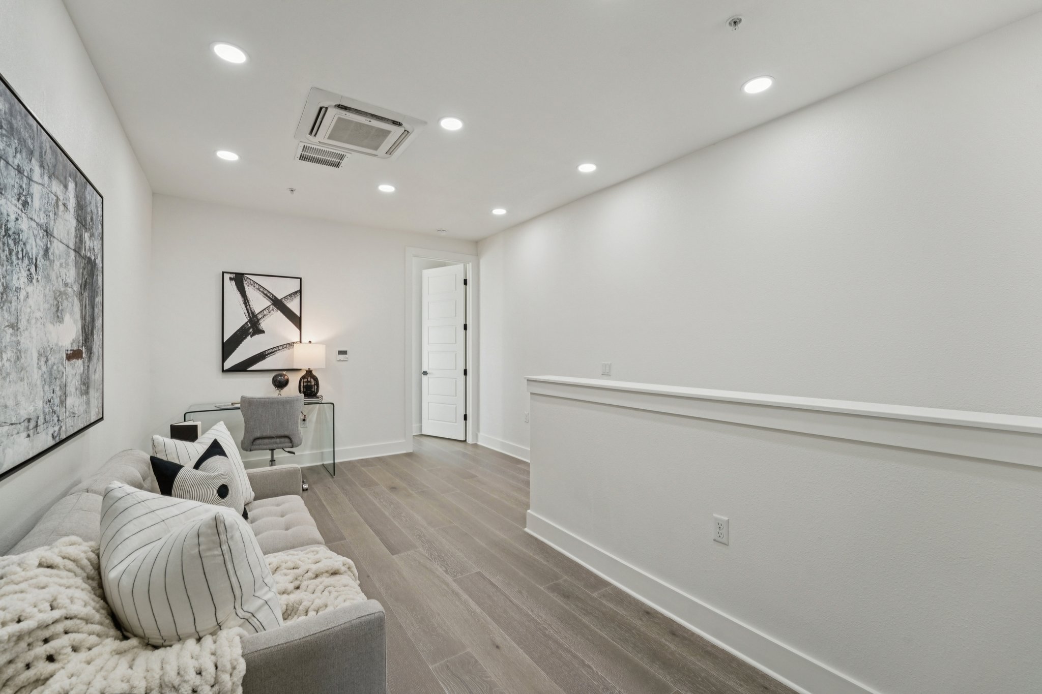 2811 Zach Scott Street Austin, TX 78723 - Photo 35 of 37 Living area with recessed lighting and light wood finished floors