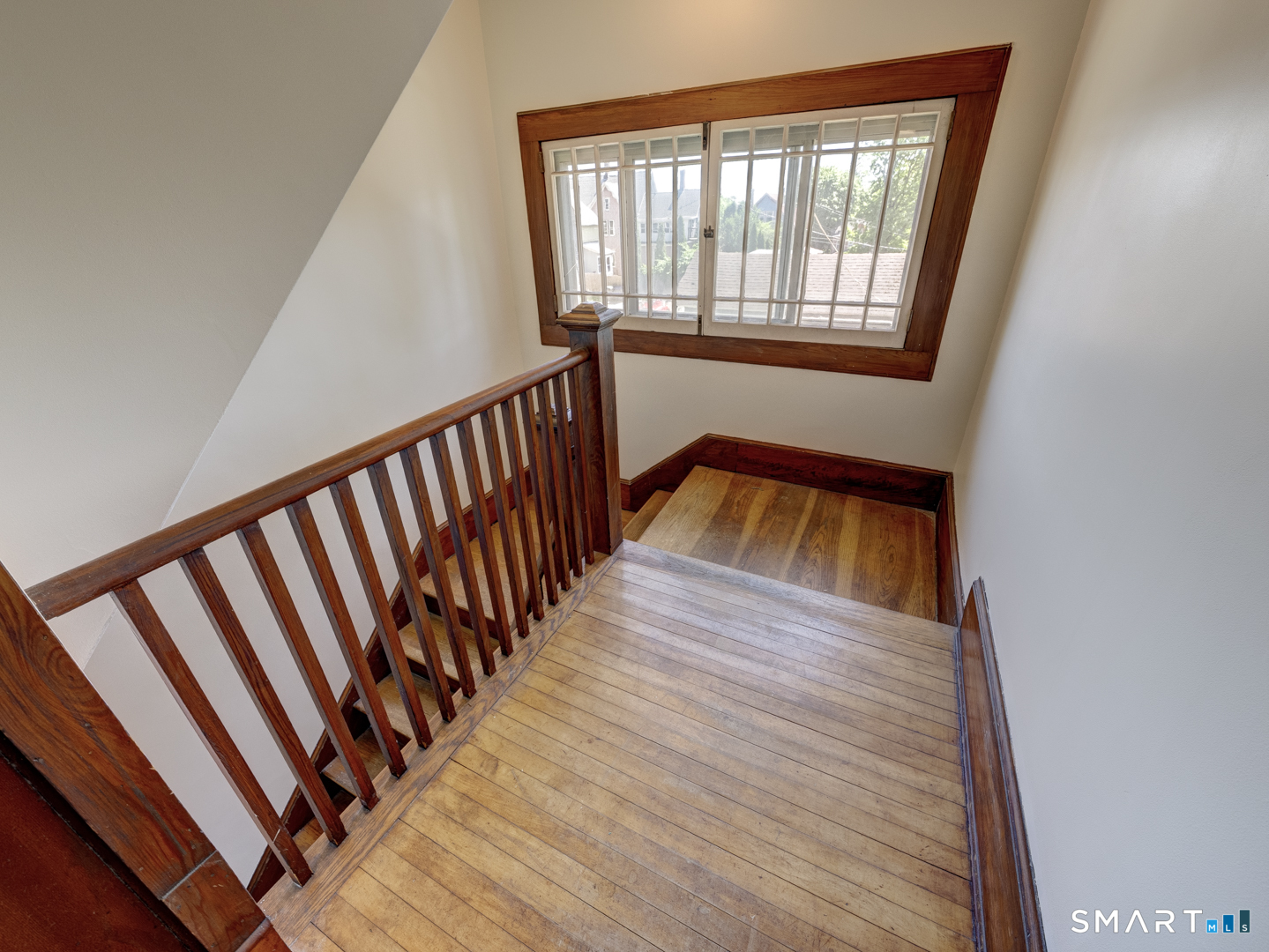 81 Chestnut Street Windham, CT 06226 - Photo 23 of 40 Top of stairs both windows open in