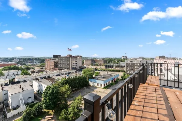 a view of a balcony with city view
