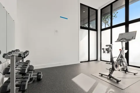 a view of a room with gym equipment