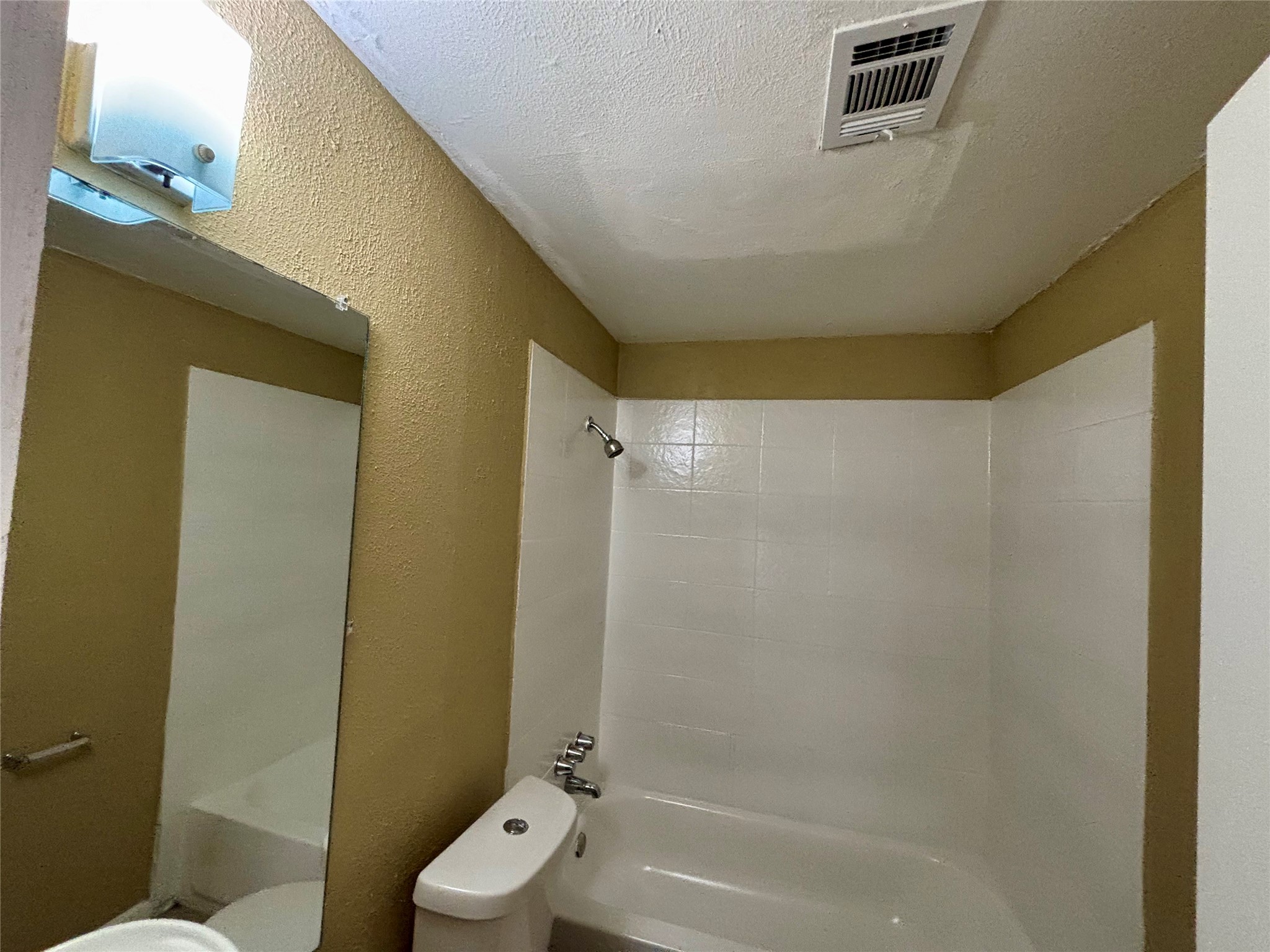 3902 Heatherbloom Drive Houston, TX 77045 - Photo 7 of 17 a bathroom with a granite countertop sink toilet and shower