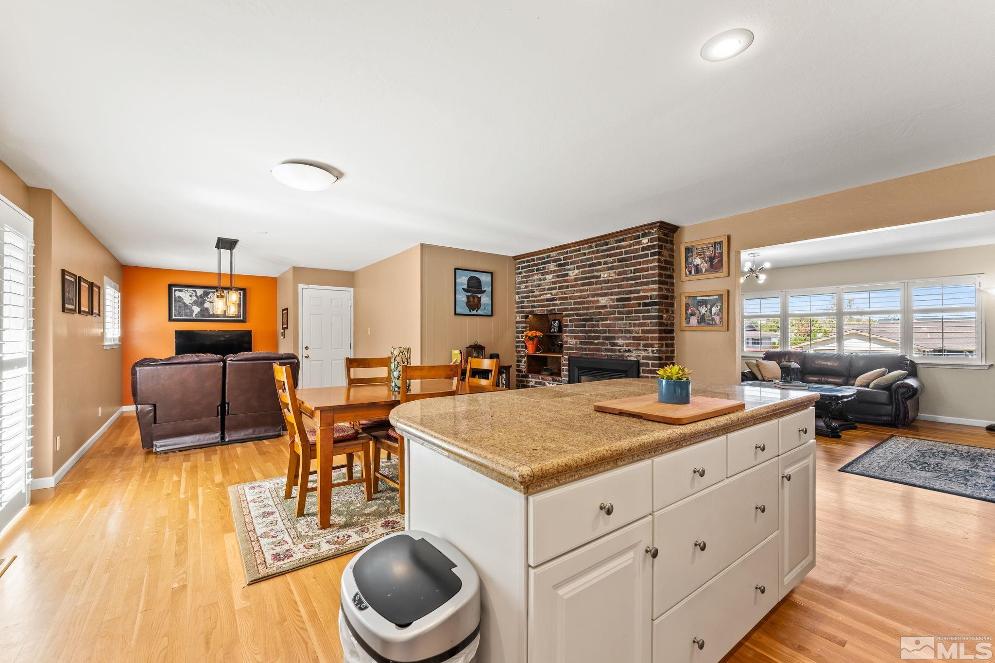 1070 Pineridge Drive Reno, NV 89509 - Photo 7 of 24 a living room with furniture and a table