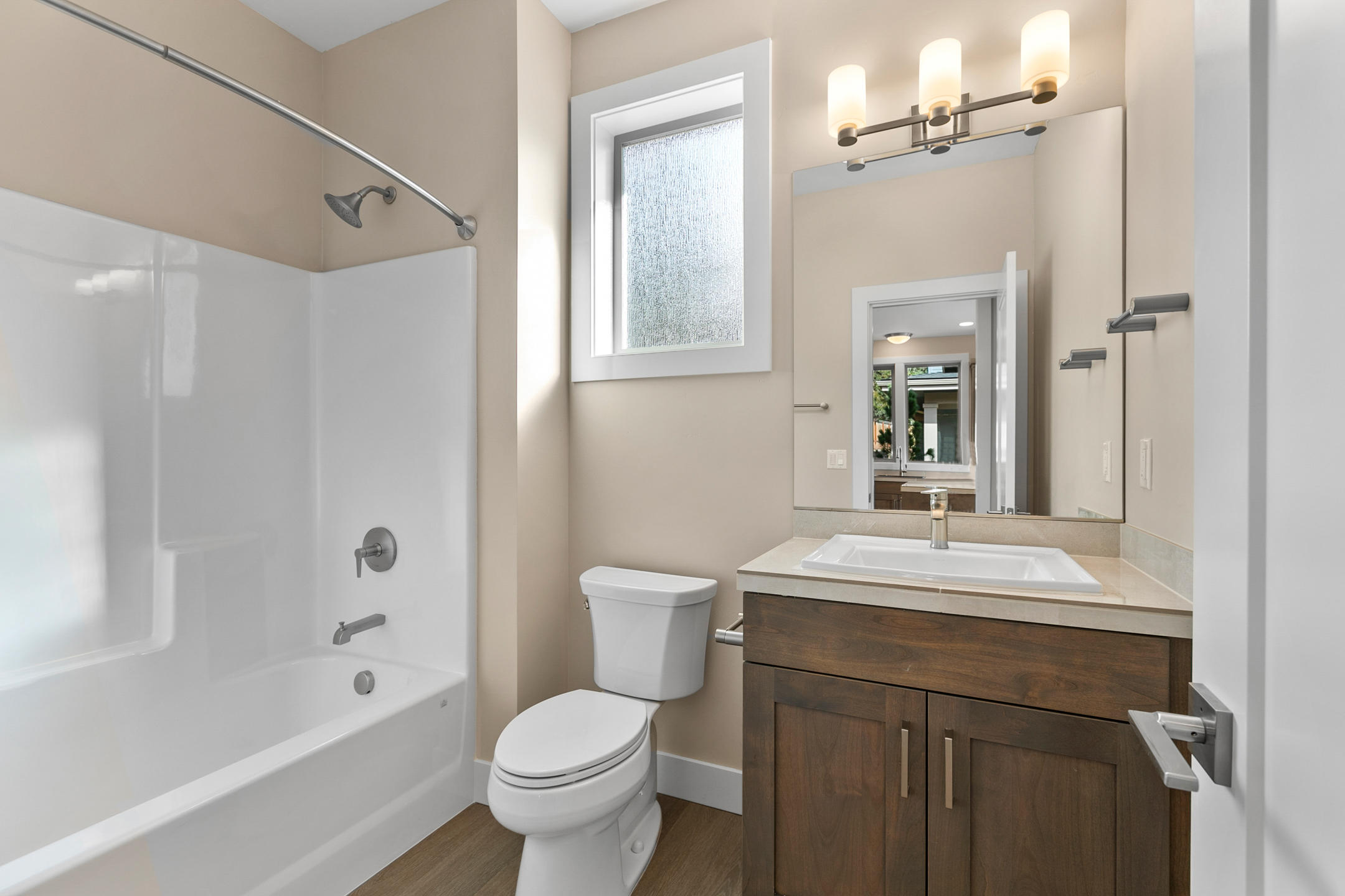 2347 Northwest Awbrey Road Bend, OR 97703 - Photo 11 of 18 a bathroom with a sink toilet tub and shower