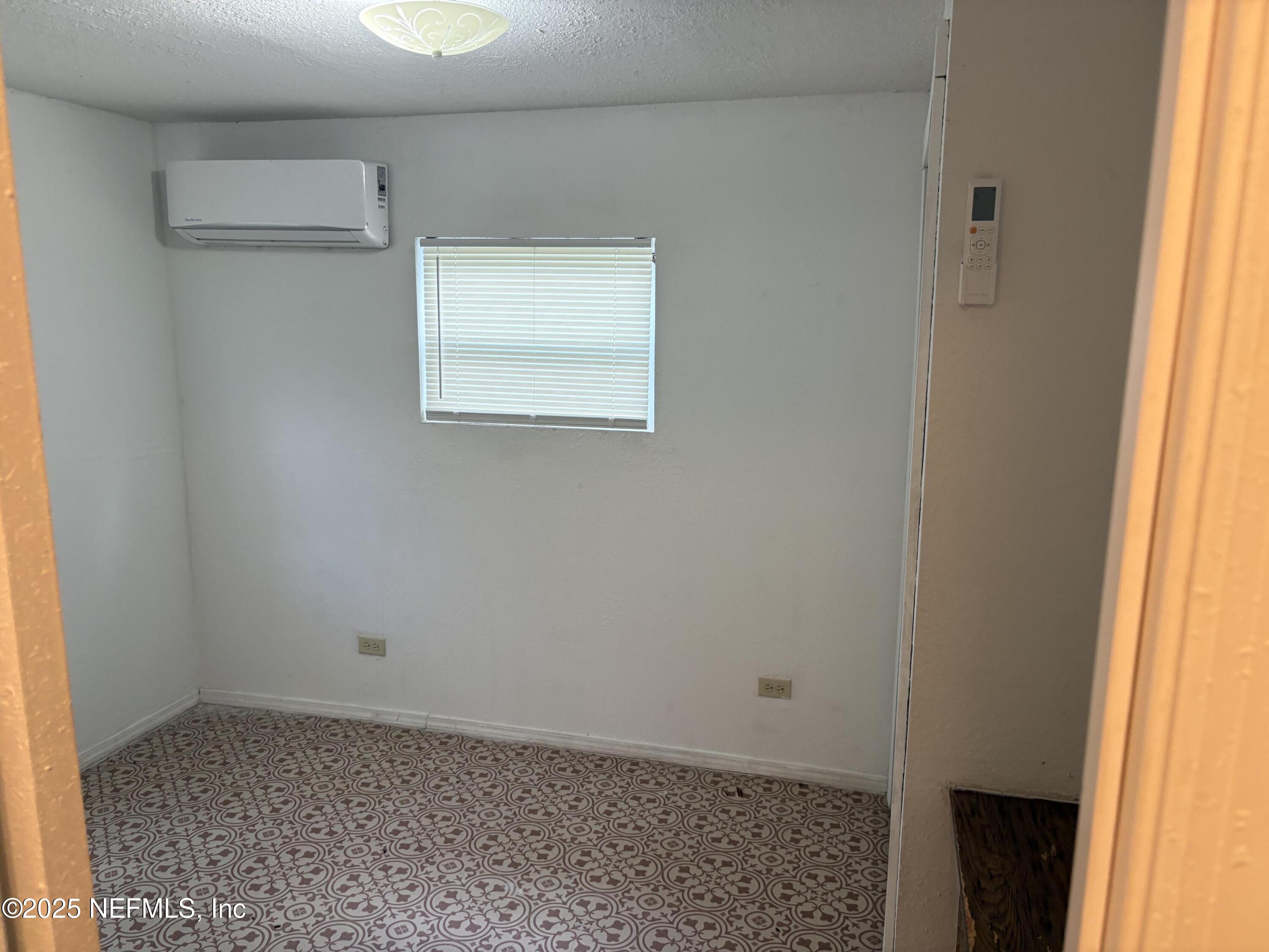 271 Heidt Road Palatka, FL 32177 - Photo 16 of 21 a view of an empty room with a window