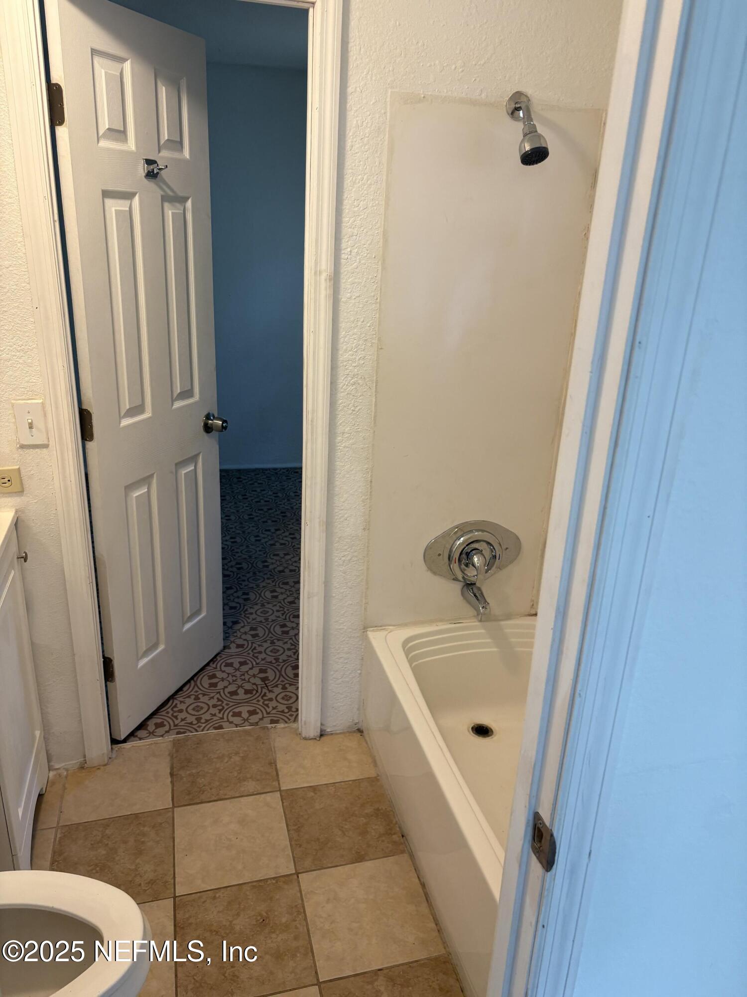 271 Heidt Road Palatka, FL 32177 - Photo 18 of 21 a bathroom with a bathtub and a shower