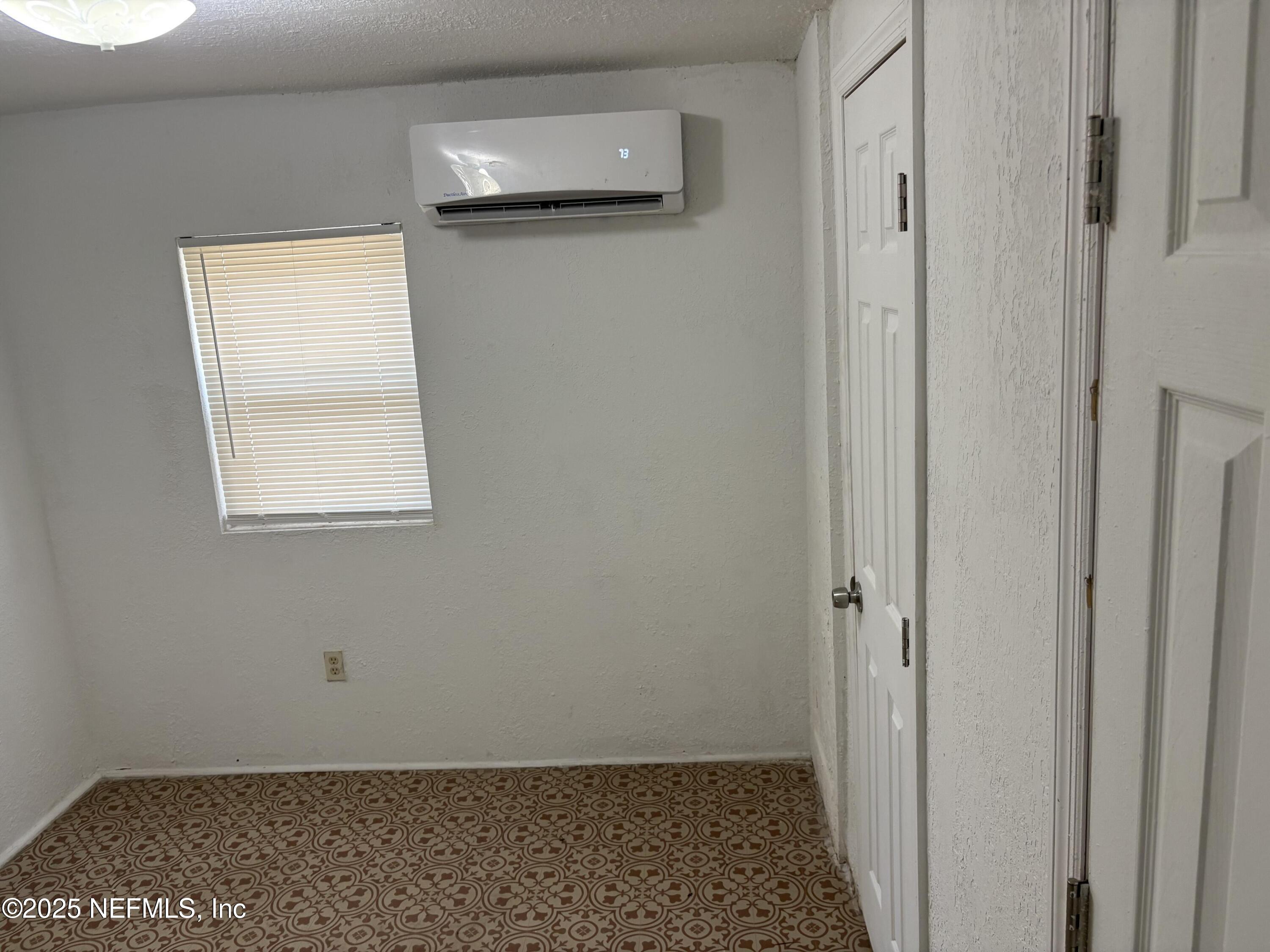 271 Heidt Road Palatka, FL 32177 - Photo 19 of 21 a view of a small space with wooden floor and a window