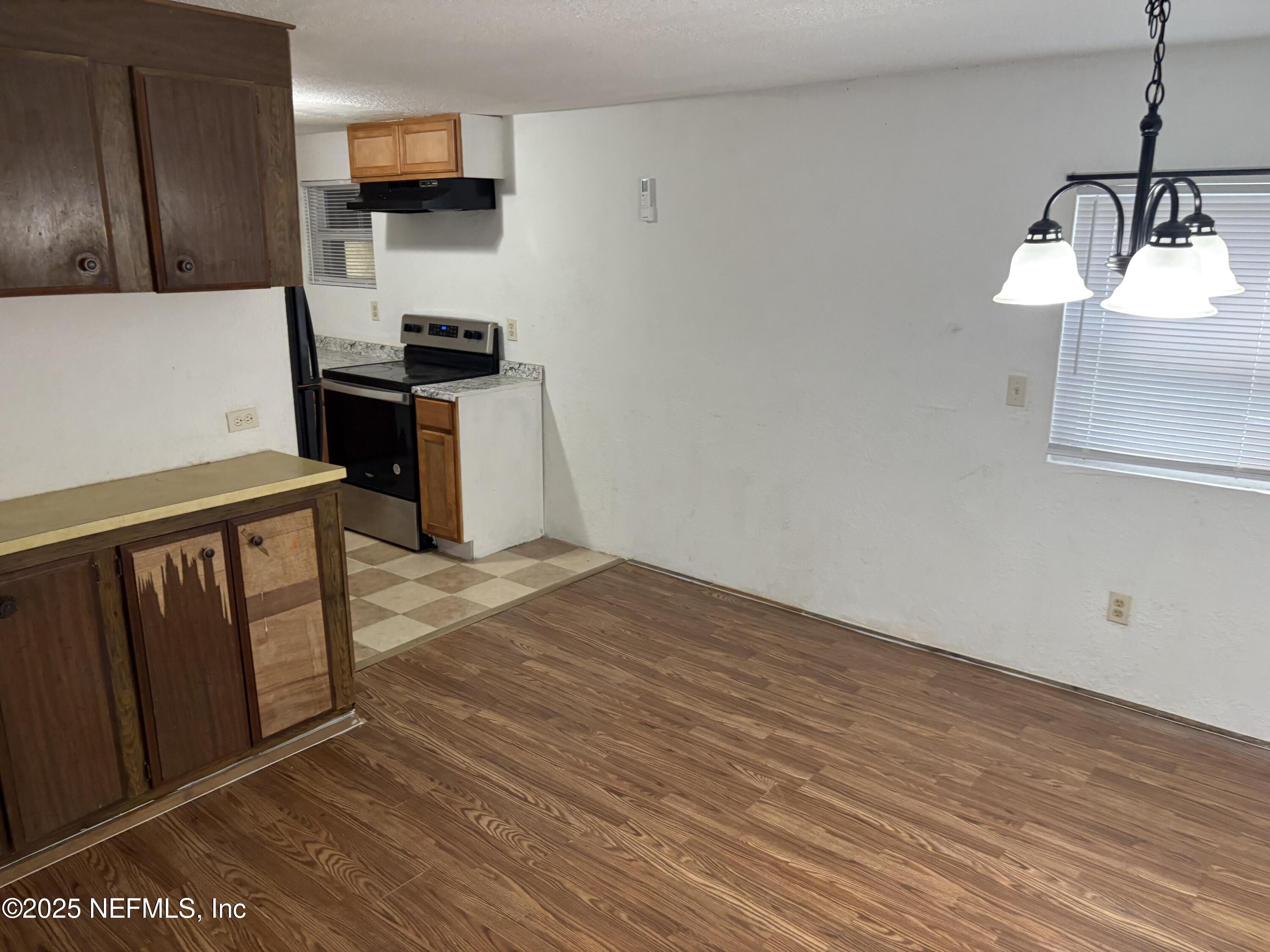 271 Heidt Road Palatka, FL 32177 - Photo 7 of 21 a kitchen with a sink and cabinets