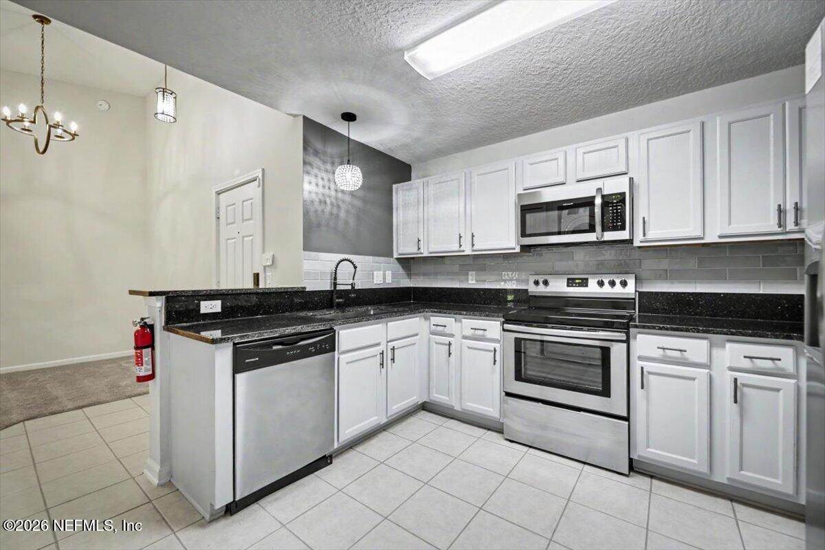 7920 Merrill Road, Unit 1010 Jacksonville, FL 32277 - Photo 9 of 23 08-CFREM_7920_Merrill_Rd_Unit_1010_Jacks