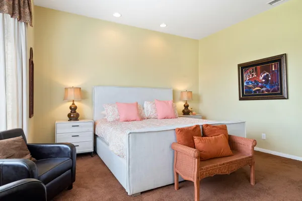 a bedroom with a bed and furniture