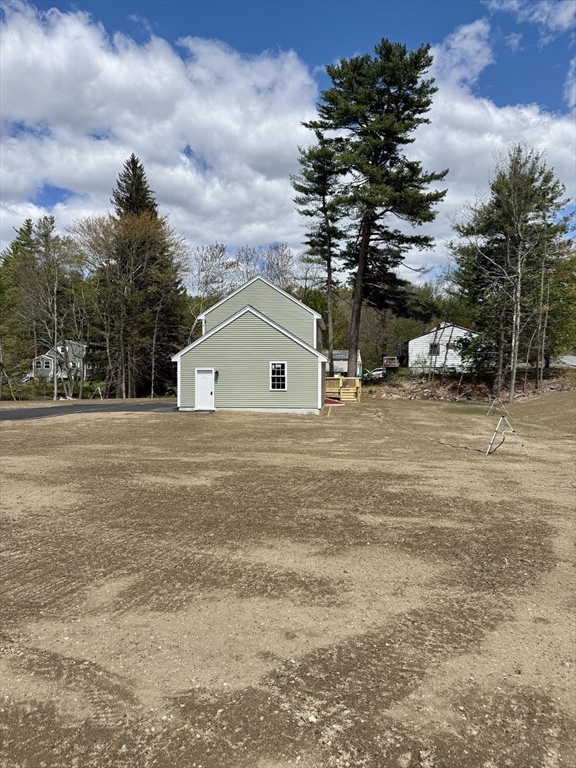 1 A Dudley Road Townsend, MA 01469 - Photo 16 of 17 a view of car parked in front of a house