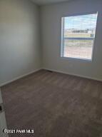 375 West Antelope Run Road Paulden, AZ 86334 - Photo 11 of 13 an empty room with a window