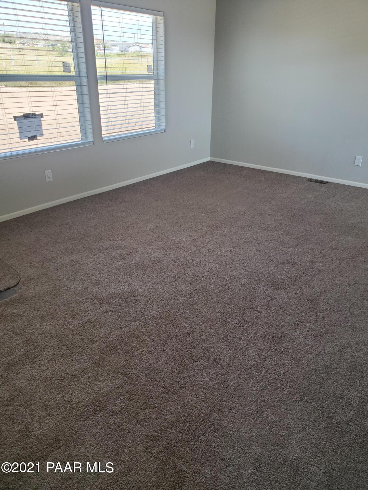 375 West Antelope Run Road Paulden, AZ 86334 - Photo 6 of 13 an empty room with a window