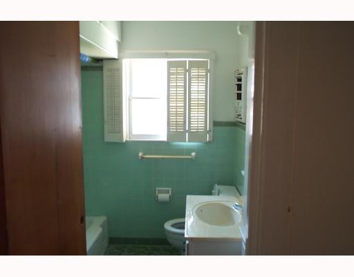 626 Vaky Street Corpus Christi, TX 78404 - Photo 4 of 7 a bathroom with sink and window