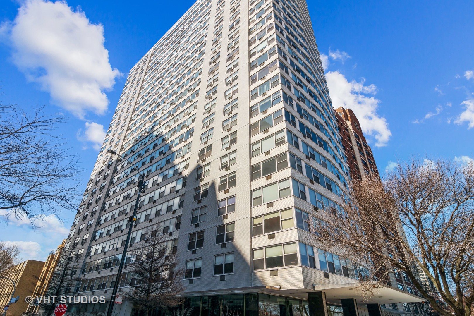 3900 North Lake Shore Drive, Unit 9J Chicago, IL 60613 - Photo 1 of 18 a view of a tall building