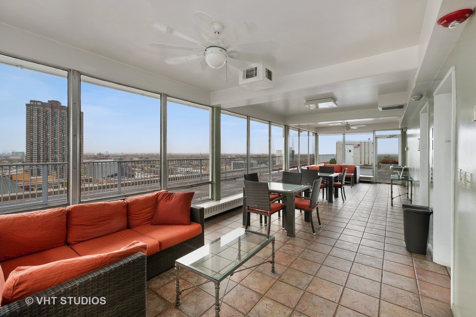 3900 North Lake Shore Drive, Unit 9J Chicago, IL 60613 - Photo 18 of 18 a living room with furniture and a large window