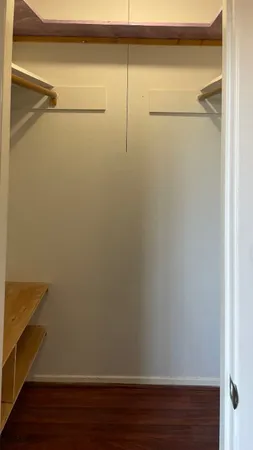 a view of small space with racks on the wall