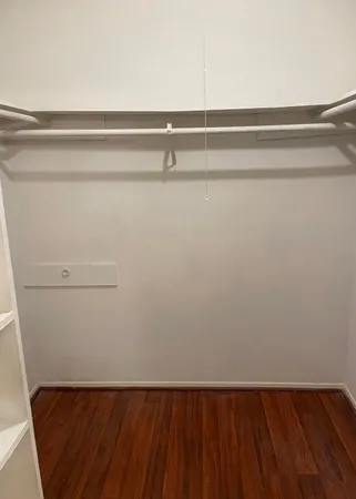 a view of small space with racks on the wall