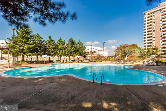 swimming pool view with a outdoor space