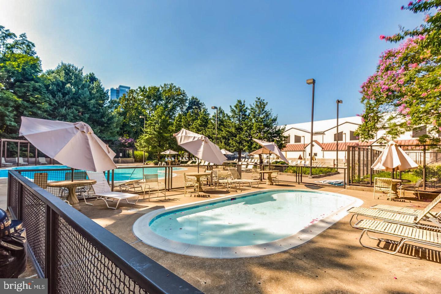 1808 Old Meadow Road, Unit 507 McLean, VA 22102 - Photo 22 of 24 swimming pool view with a outdoor space