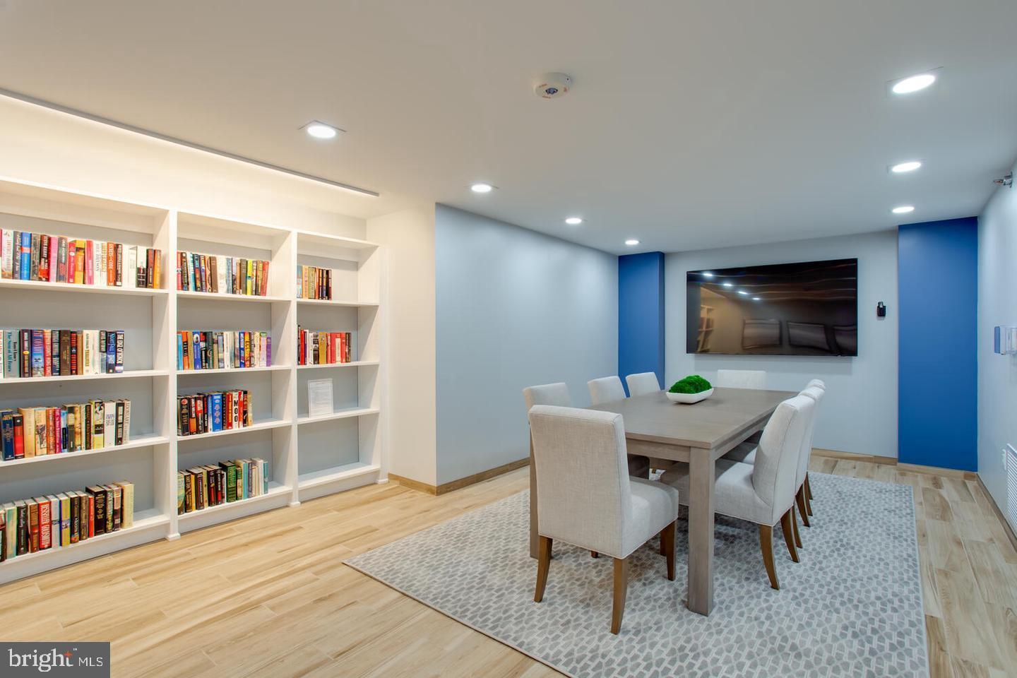 1808 Old Meadow Road, Unit 507 McLean, VA 22102 - Photo 24 of 24 a view of a livingroom with furniture and a bookshelf