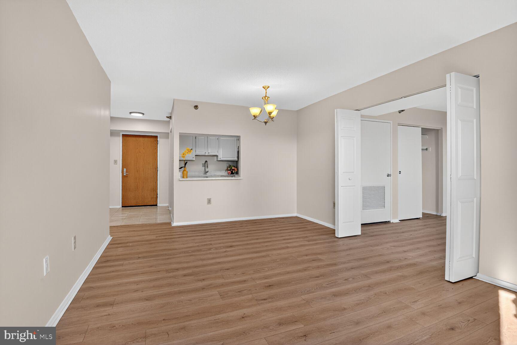 1808 Old Meadow Road, Unit 507 McLean, VA 22102 - Photo 3 of 24 a view of a kitchen with a sink and a window