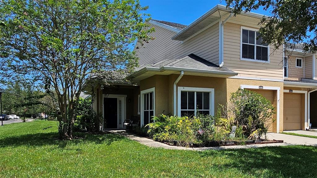 8202 Down Royal Road Tampa, FL 33610 - Photo 1 of 1 front view of a house with a yard