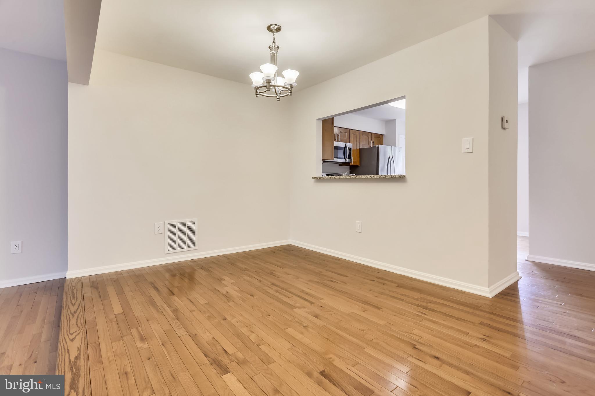 10804 Douglas Avenue Silver Spring, MD 20902 - Photo 11 of 36 Dining room with hardwood flooring