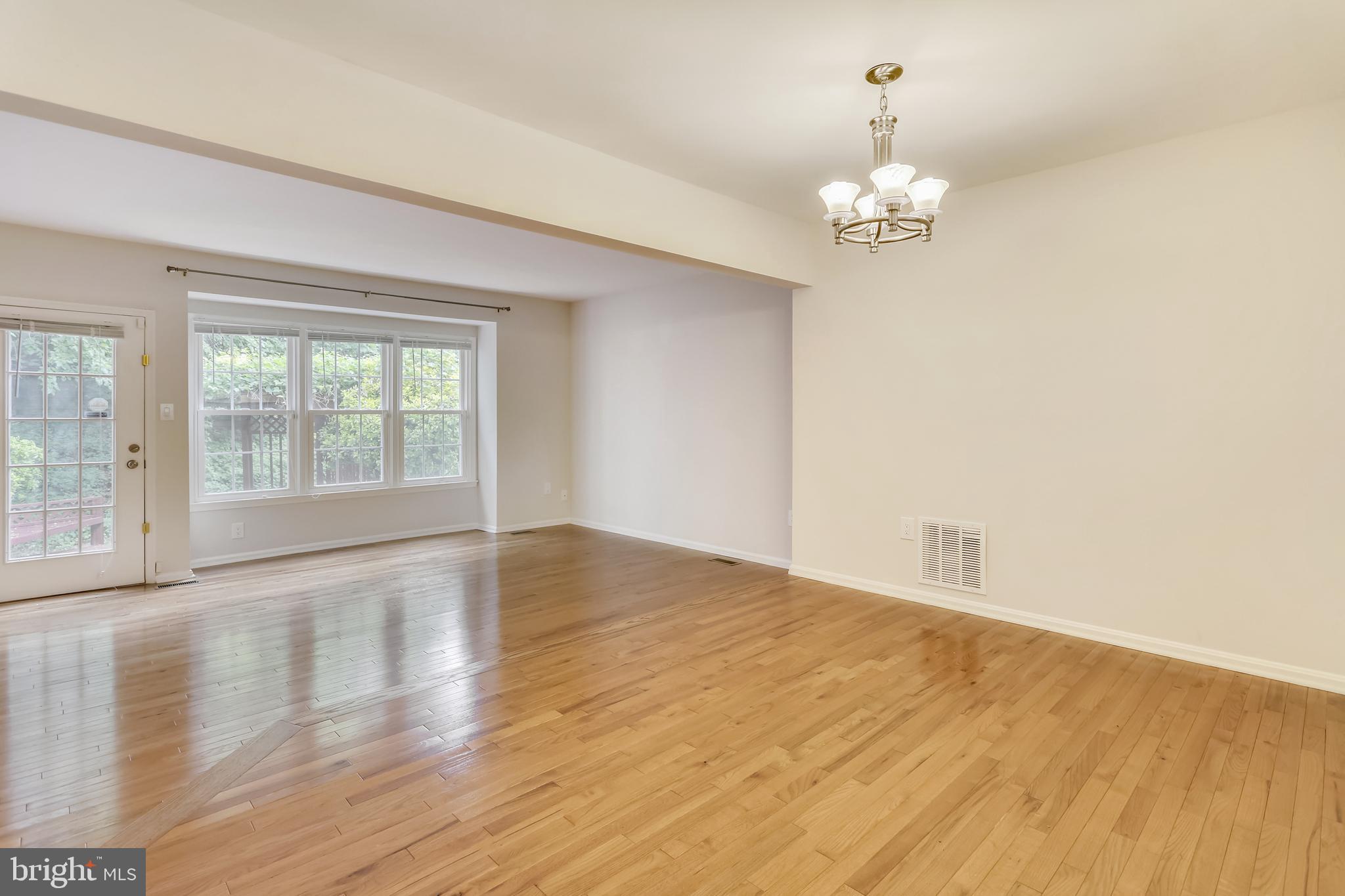 10804 Douglas Avenue Silver Spring, MD 20902 - Photo 13 of 36 Dining room open to living room