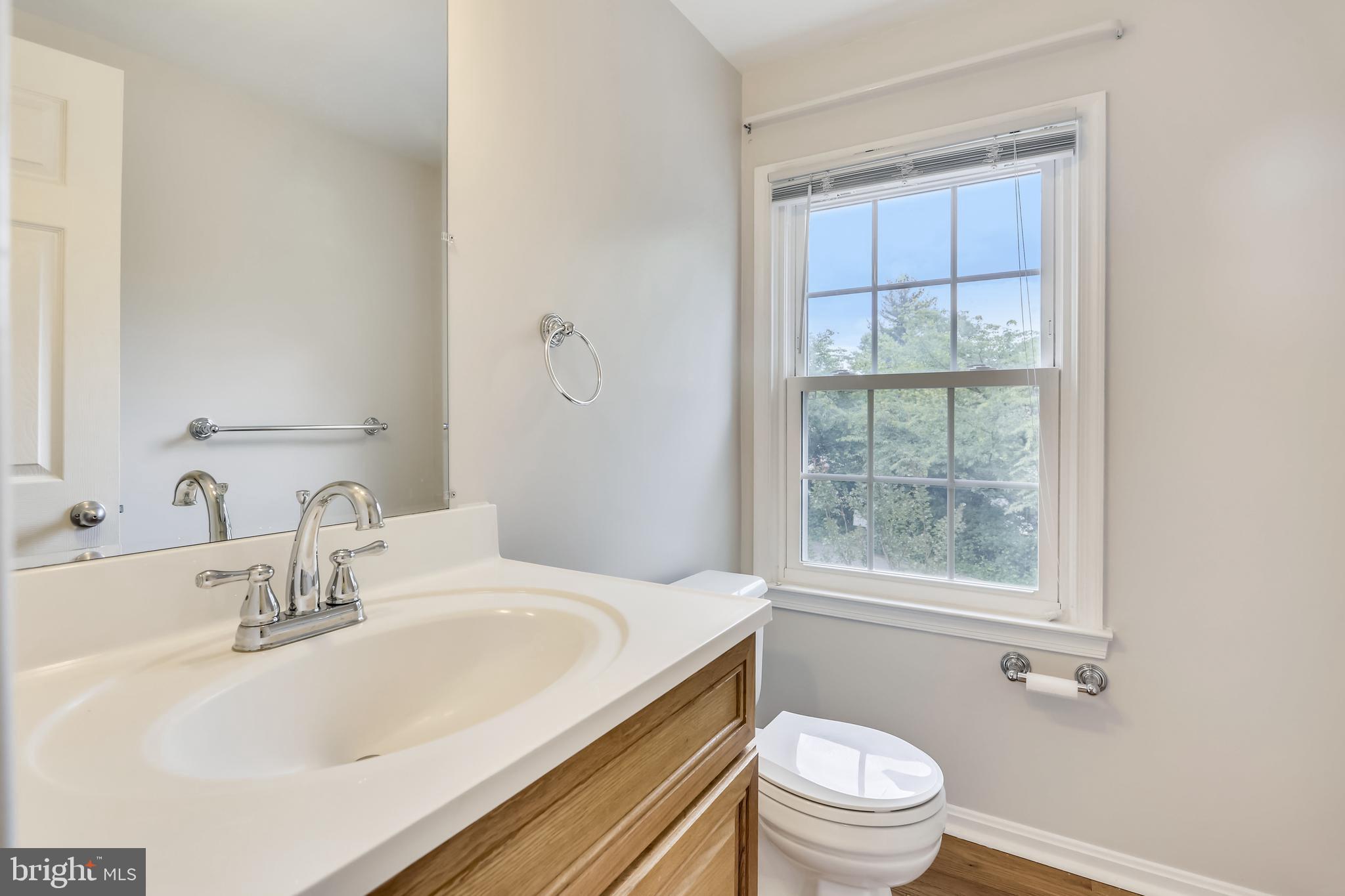 10804 Douglas Avenue Silver Spring, MD 20902 - Photo 17 of 36 Updated powder room on main level