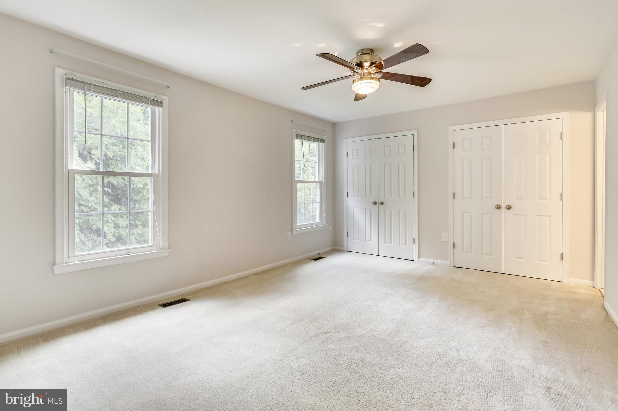 10804 Douglas Avenue Silver Spring, MD 20902 - Photo 19 of 36 Primary bedroom suite with wall-to-wall closets