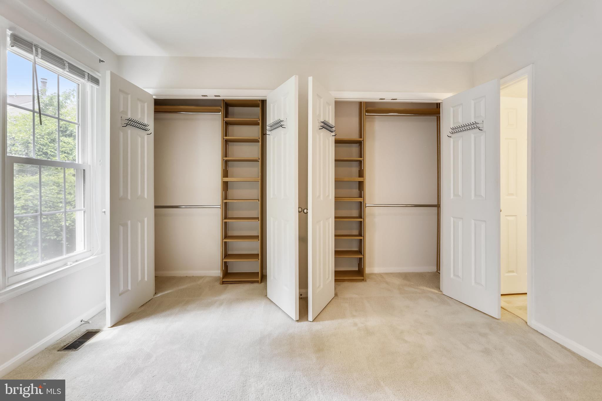 10804 Douglas Avenue Silver Spring, MD 20902 - Photo 21 of 36 Primary bedroom w/ closet built-in shelving