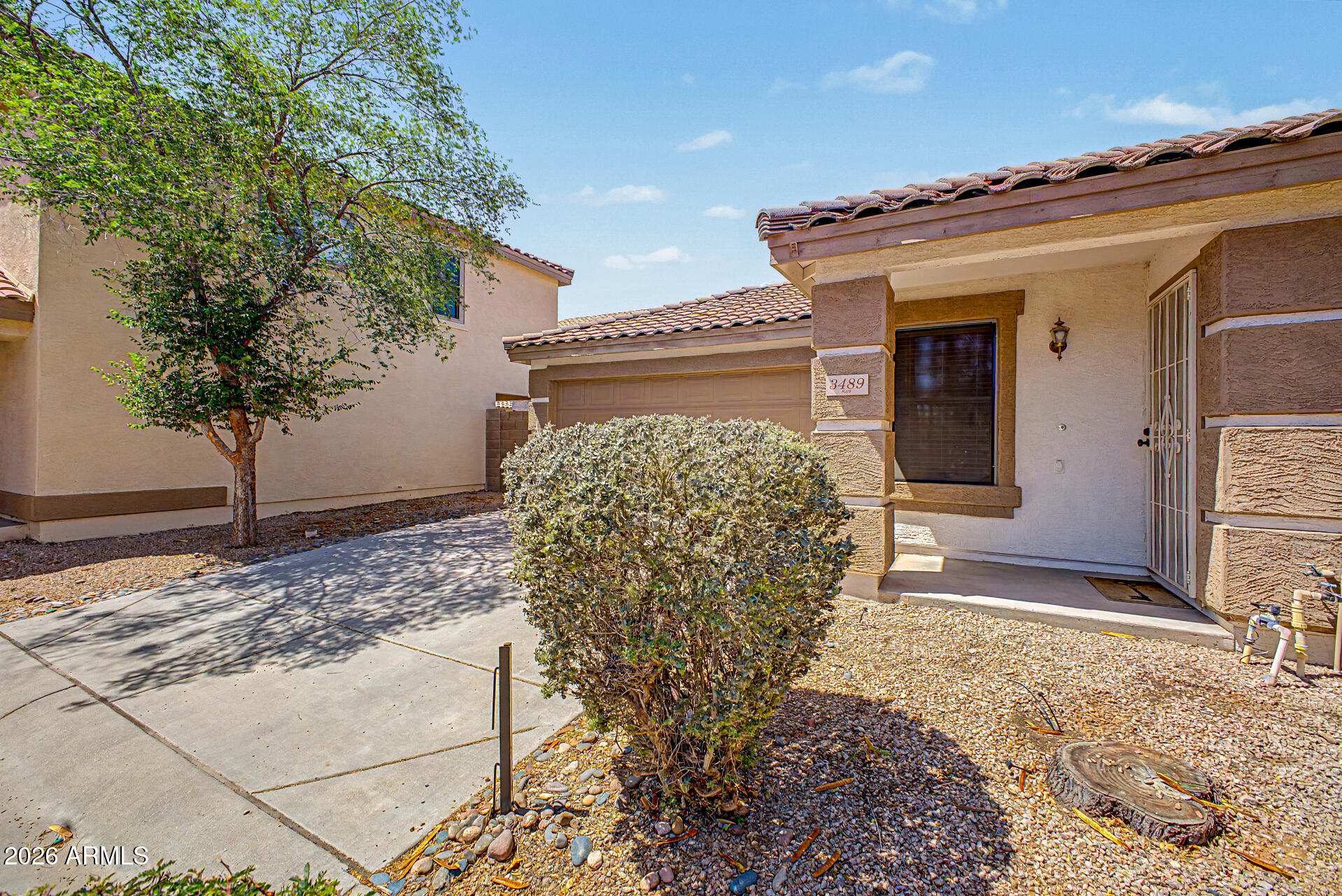 3489 South Bowman Road Apache Junction, AZ 85119 - Photo 11 of 24 a view of a house with a yard