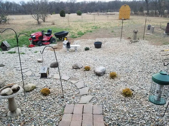 a table and chairs in the outdoor space