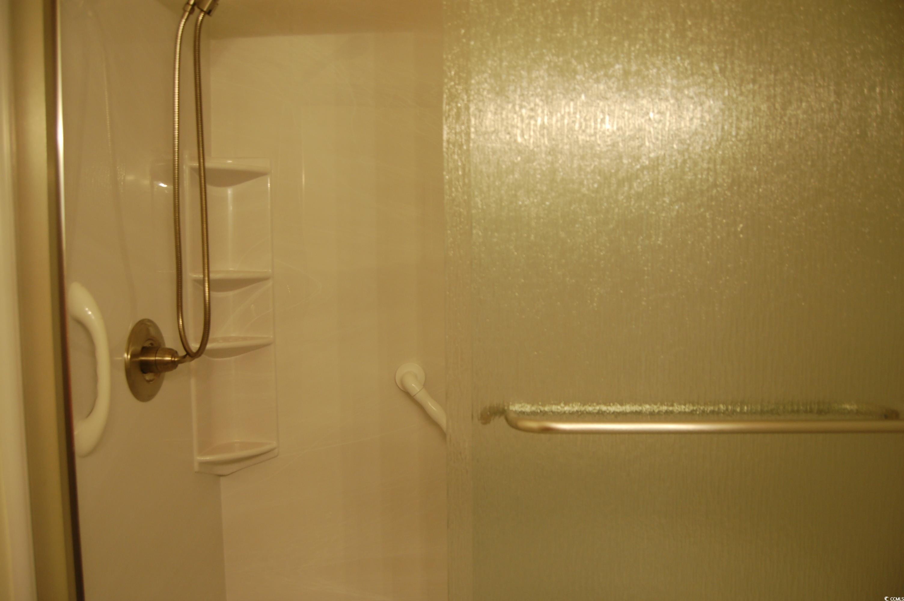 1537 Lanterns Rest Road, Unit 203 Myrtle Beach, SC 29579 - Photo 13 of 35 Bathroom featuring a shower stall