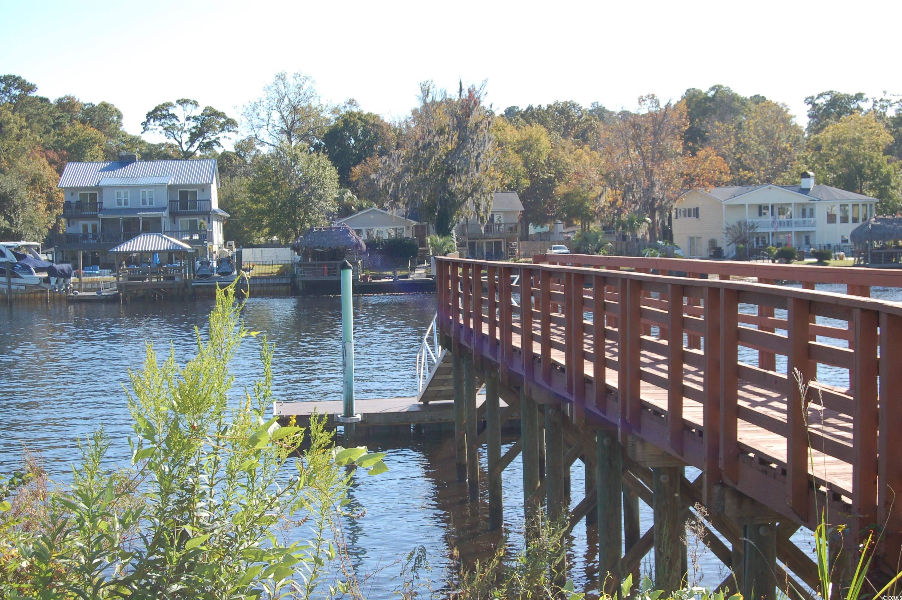 1537 Lanterns Rest Road, Unit 203 Myrtle Beach, SC 29579 - Photo 28 of 35 Dock with a water view