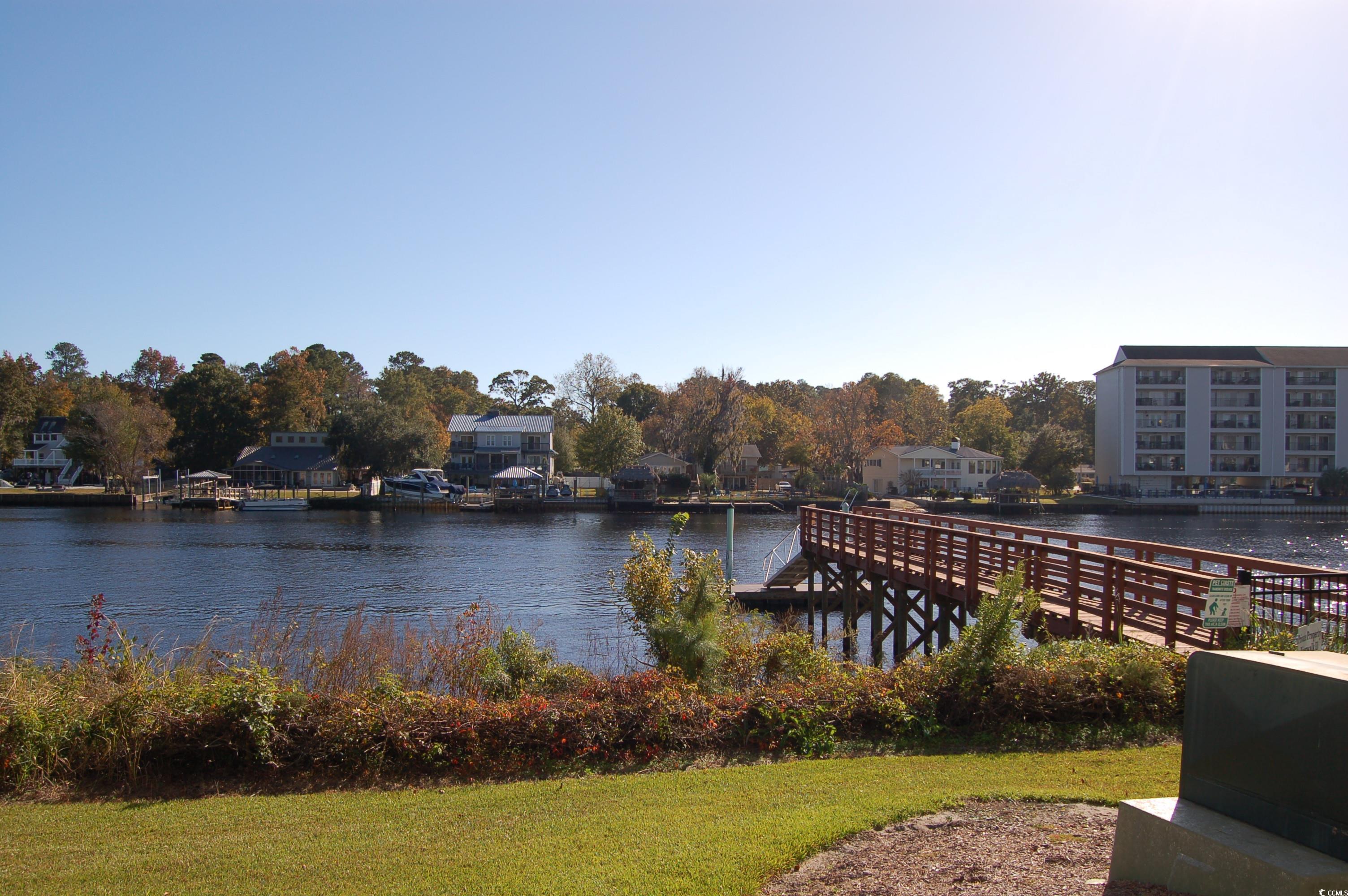 1537 Lanterns Rest Road, Unit 203 Myrtle Beach, SC 29579 - Photo 30 of 35 Dock featuring a water view