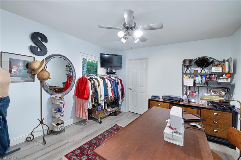 5340 Tamarind Ridge Drive Naples, FL 34119 - Photo 14 of 32 a view of gym equipment and children play room