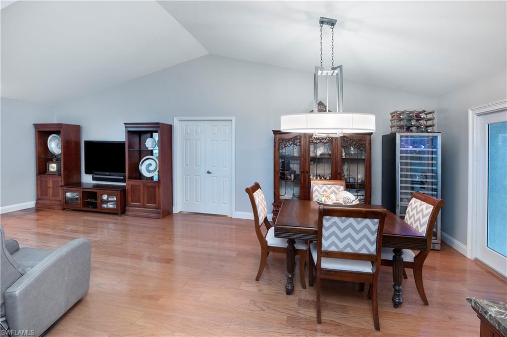 5340 Tamarind Ridge Drive Naples, FL 34119 - Photo 15 of 32 a dining room with furniture and window