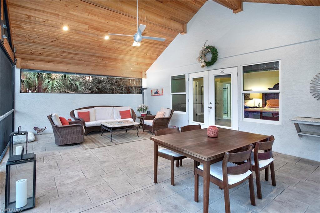 5340 Tamarind Ridge Drive Naples, FL 34119 - Photo 3 of 32 a outdoor space with furniture