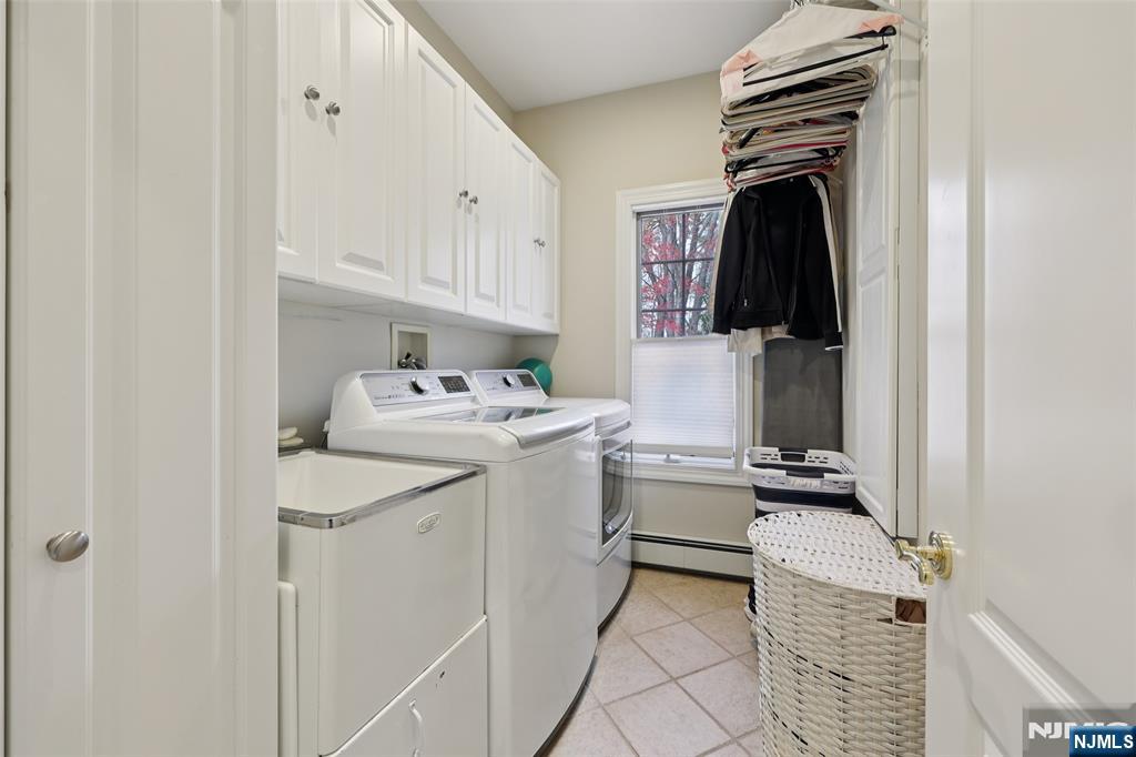 14 Henion Garden Mahwah, NJ 07430 - Photo 17 of 38 a room with a storage and utility