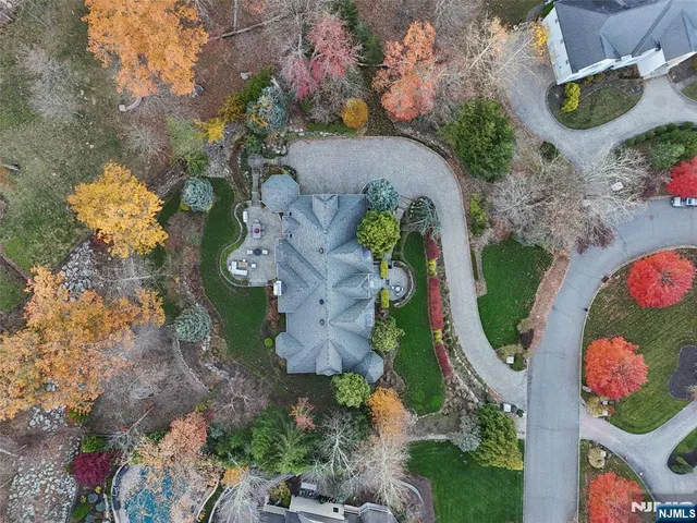 an aerial view of a house a lot of flower plants