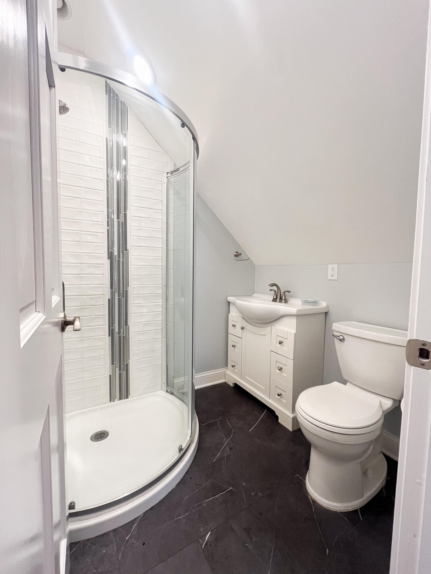509 North Main Street Hebron, IN 46341 - Photo 22 of 27 a bathroom with a toilet sink and shower