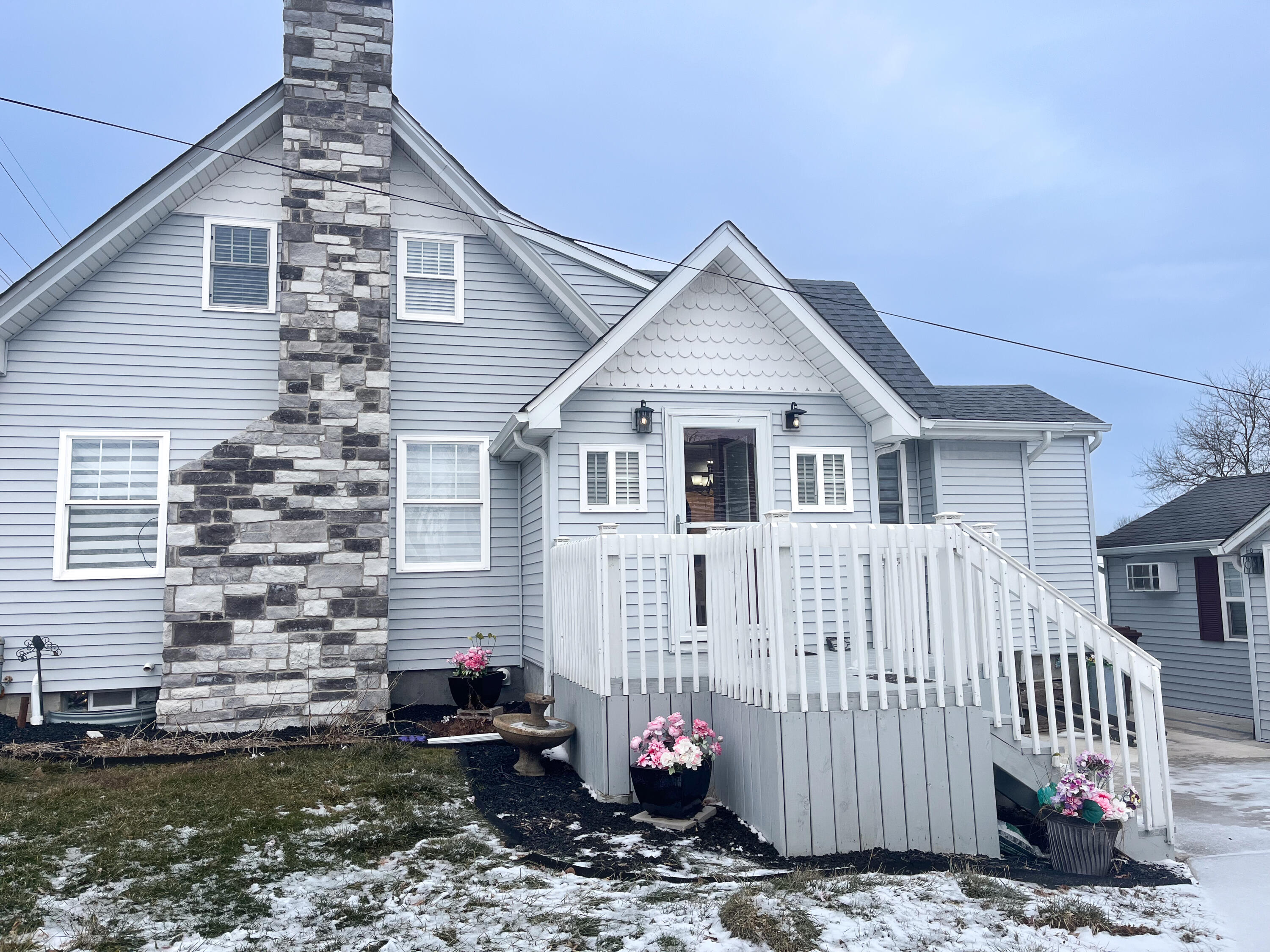 509 North Main Street Hebron, IN 46341 - Photo 4 of 27 a view of a house with a yard