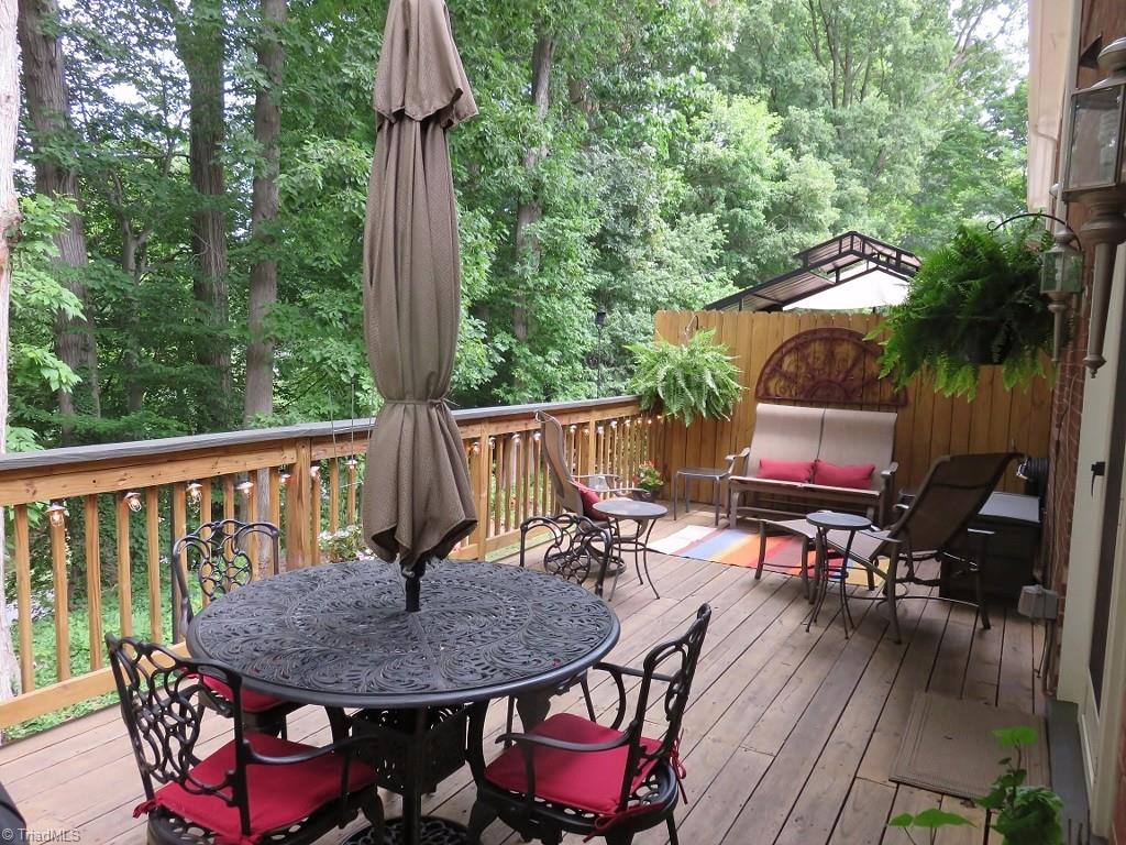 538 Lindley Road Greensboro, NC 27410 - Photo 13 of 29 This totally rebuilt deck is great for entertaining and and provides a serenely wooded view. Plenty of room to hang birdhouses and watch wildlife.