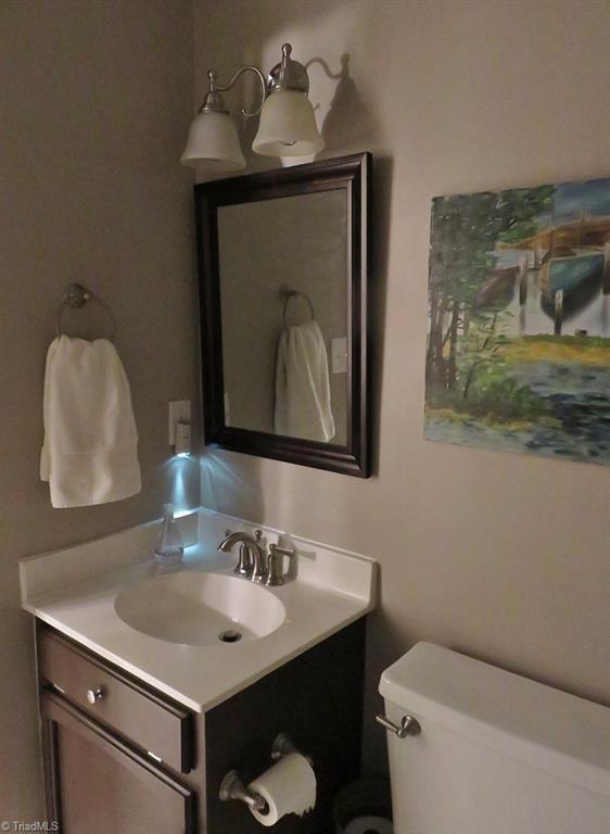 538 Lindley Road Greensboro, NC 27410 - Photo 19 of 29 Vanity area two is shown here and includes a generously sized newly updated walk-in shower.