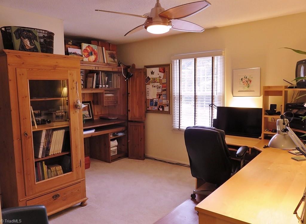 538 Lindley Road Greensboro, NC 27410 - Photo 22 of 29 The bedroom has a walk -in closet and is presently used as an office. All new vinyl windows are throughout the home.