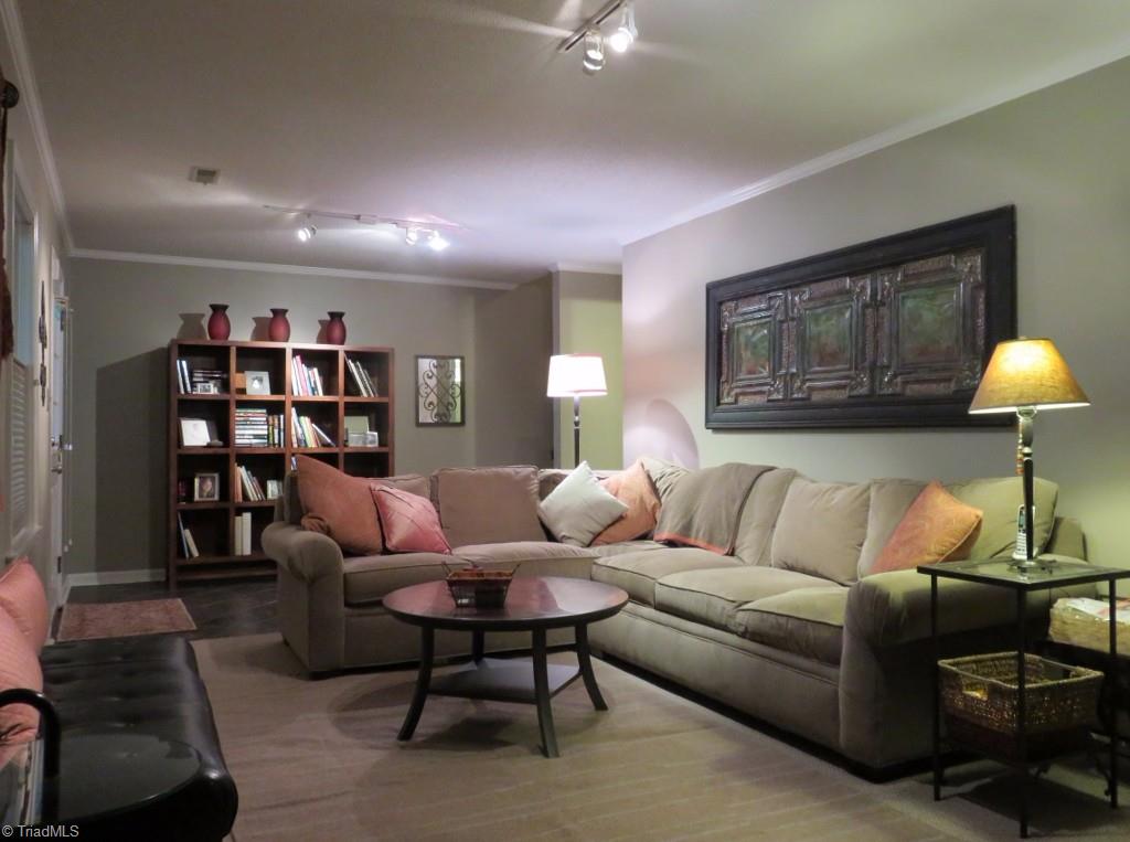 538 Lindley Road Greensboro, NC 27410 - Photo 24 of 29 Track lighting has been installed here. Most of the furniture is available for sale so ask about it if interested.